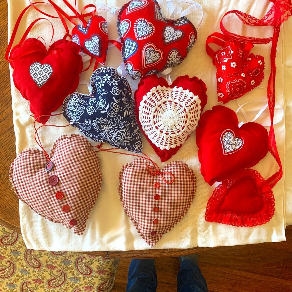 Assortment of handmade fabric , stuffed hanging hearts. (10 various sizes.)